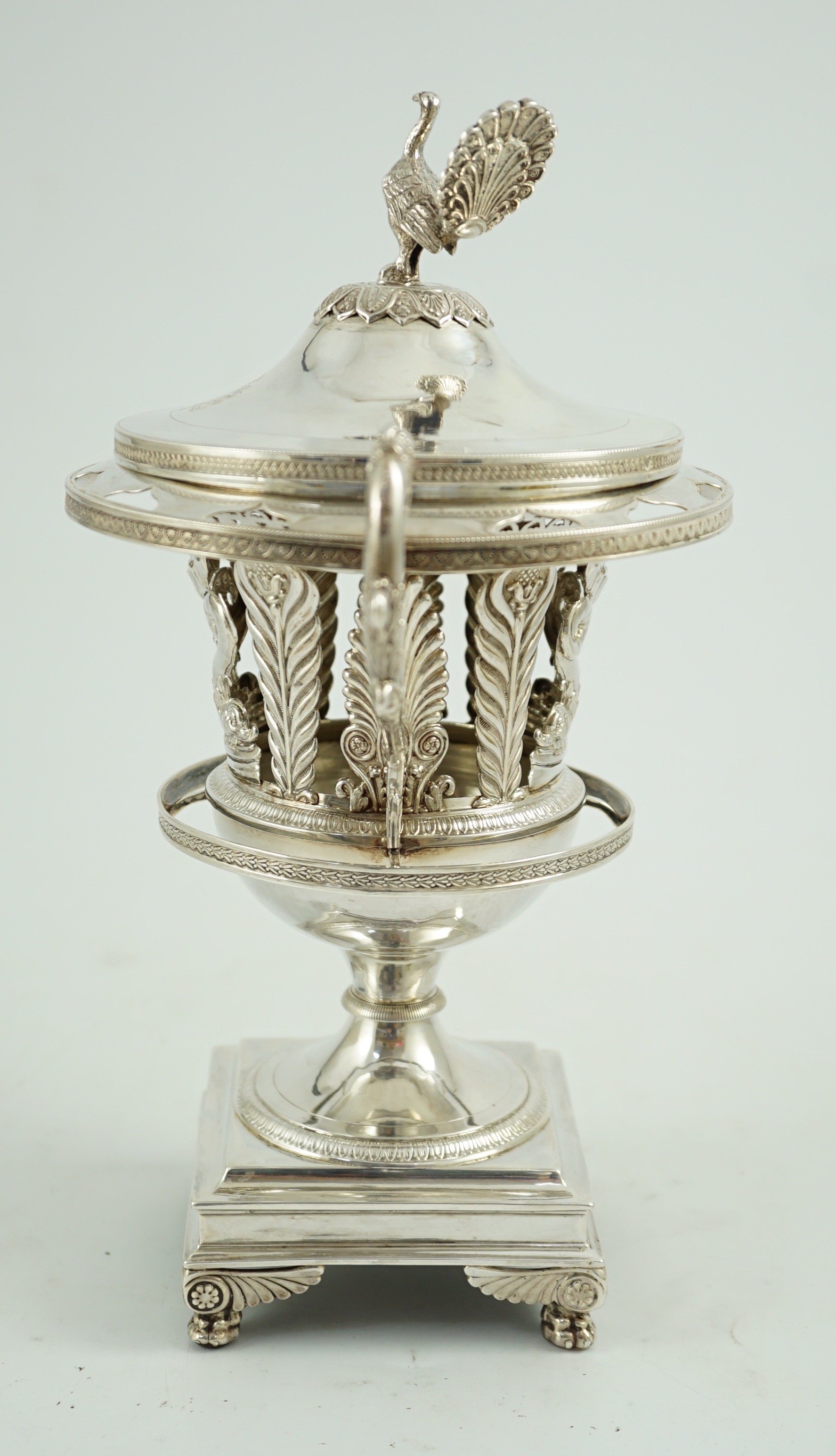 A 19th century ornate French pierced silver two handled urn shaped vase and cover